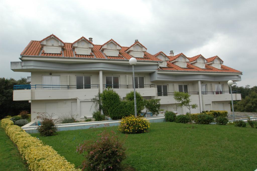Apartamentos La Arena Isla Exterior foto